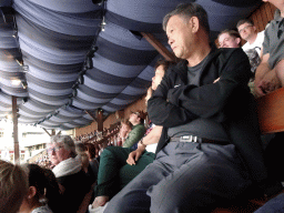 Miaomiao and Miaomiao`s parents looking at the Raveleijn Parkshow at the Raveleijn theatre at the Marerijk kingdom