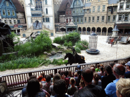 Actors and horse on the stage of the Raveleijn theatre at the Marerijk kingdom, during the Raveleijn Parkshow