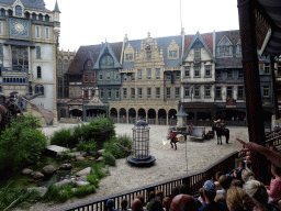 Actors, horse and dragon on the stage of the Raveleijn theatre at the Marerijk kingdom, during the Raveleijn Parkshow