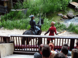 Actors and horse on the stage of the Raveleijn theatre at the Marerijk kingdom, during the Raveleijn Parkshow