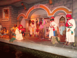 Belly dancer at the front portal of the Prison scene at the Fata Morgana attraction at the Anderrijk kingdom