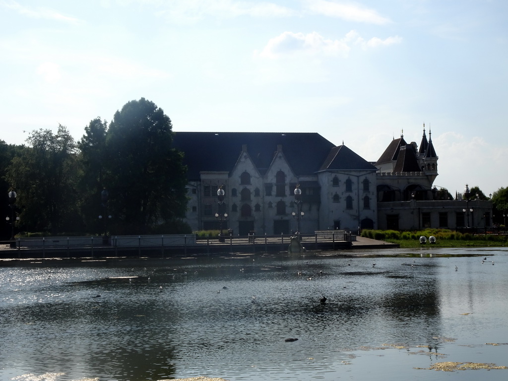 The Aquanura lake at the Fantasierijk kingdom and the Efteling Theatre at the Anderrijk kingdom