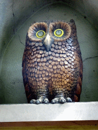 Owl statue at the facade of the Leerhuys building at the Laafland attraction at the Marerijk kingdom
