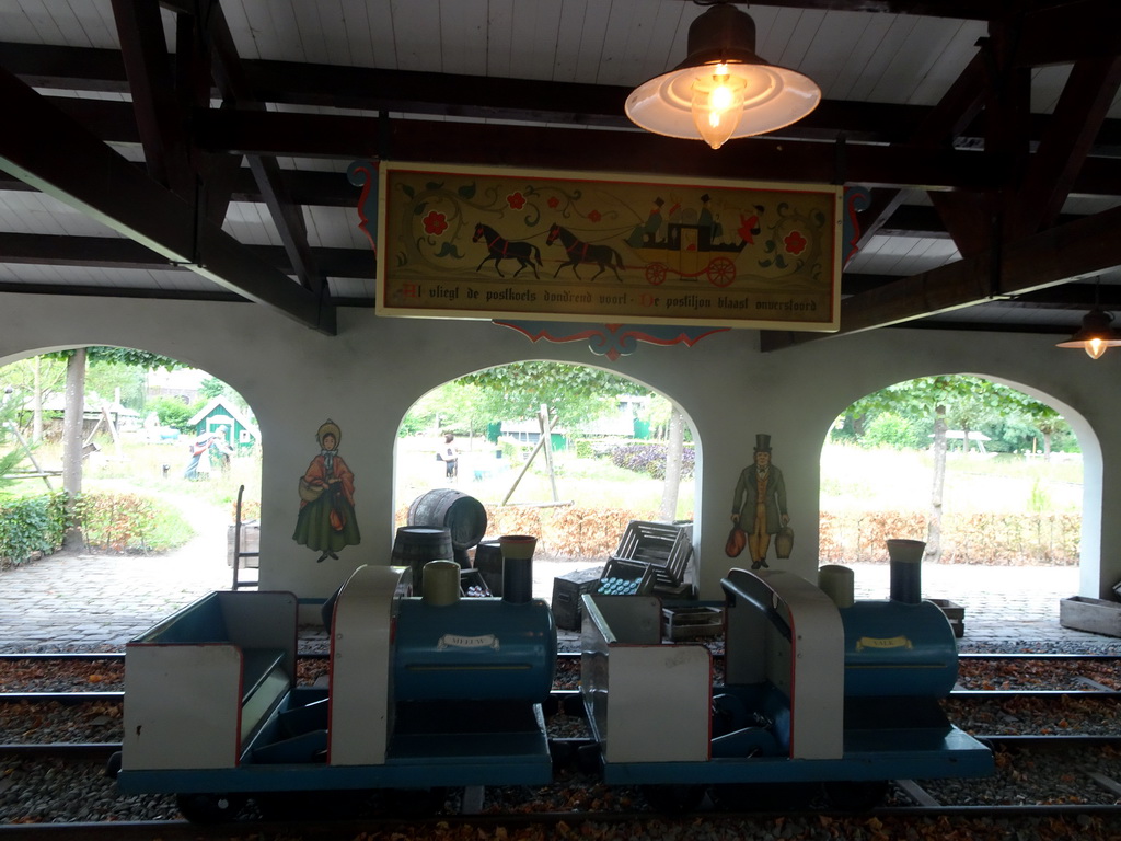 Trains and sign at the Kinderspoor attraction at the Ruigrijk kingdom