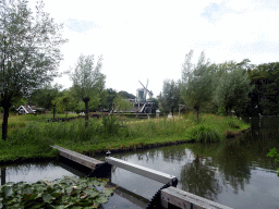 Windmill at the Kinderspoor attraction at the Ruigrijk kingdom, viewed from the train