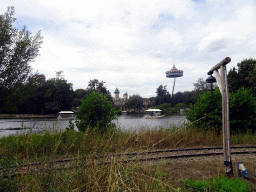 The Gondoletta lake and Pagoda attraction at the Reizenrijk kingdom and the Symbolica attraction at the Fantasierijk kingdom, viewed from the train of the Kinderspoor attraction at the Ruigrijk kingdom