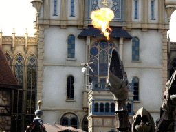 Dragon spitting fire on the stage of the Raveleijn theatre at the Marerijk kingdom, during the Raveleijn Parkshow