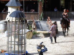 Actors and horse on the stage of the Raveleijn theatre at the Marerijk kingdom, during the Raveleijn Parkshow