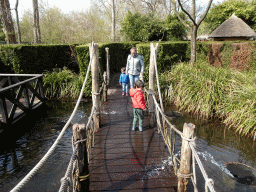 Max on a bridge with fountains at the Adventure Maze at the Reizenrijk kingdom