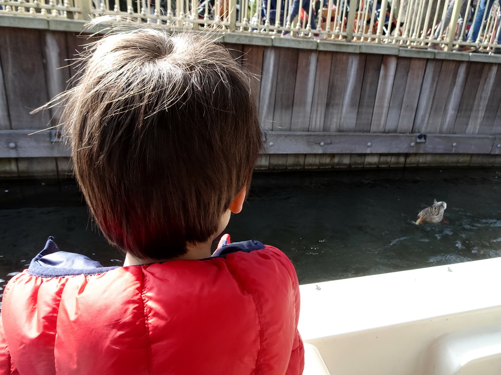 Max with a duck at the Gondoletta attraction at the Reizenrijk kingdom