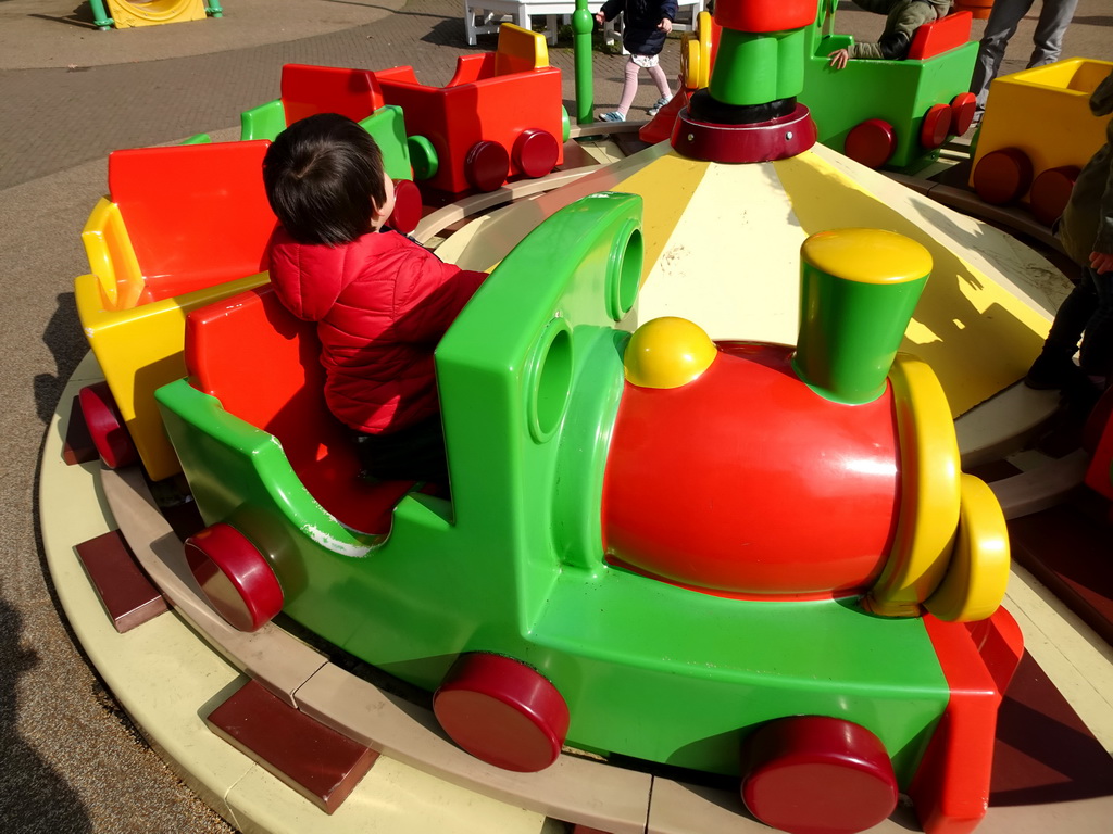 Max on the train at the Kleuterhof playground at the Reizenrijk kingdom