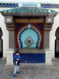 Max playing with bubbles in front of toilets near the Fata Morgana attraction at the Anderrijk kingdom