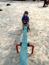 Max on a seesaw at the Kindervreugd playground at the Marerijk kingdom