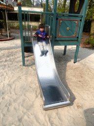 Max on a slide at the Kindervreugd playground at the Marerijk kingdom
