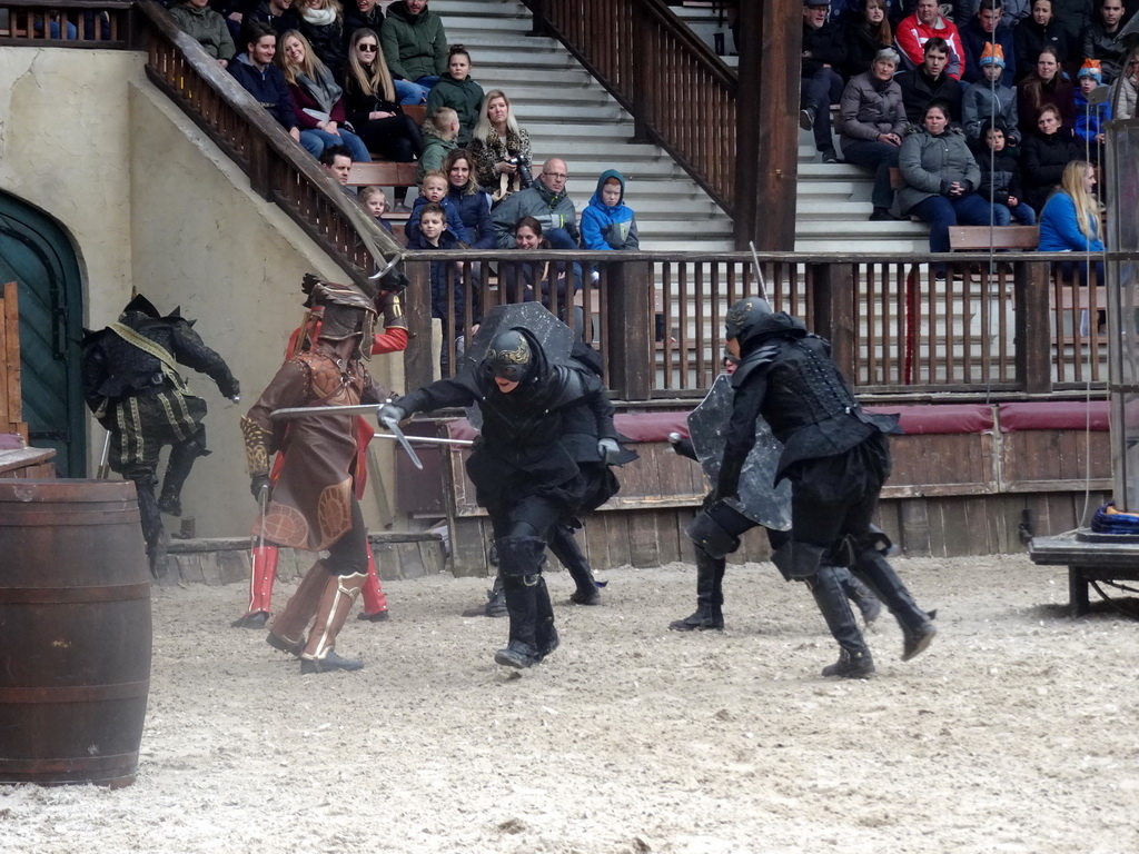 Actors on the stage of the Raveleijn theatre at the Marerijk kingdom, during the Raveleijn Parkshow, viewed from the Wapen van Raveleijn restaurant