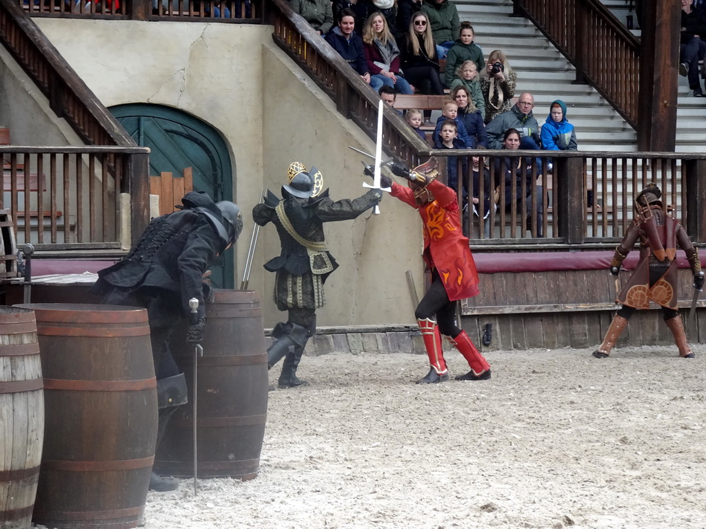 Actors on the stage of the Raveleijn theatre at the Marerijk kingdom, during the Raveleijn Parkshow, viewed from the Wapen van Raveleijn restaurant