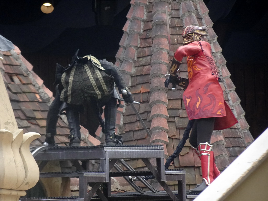 Actors on the stage of the Raveleijn theatre at the Marerijk kingdom, during the Raveleijn Parkshow, viewed from the Wapen van Raveleijn restaurant