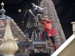 Actors on the stage of the Raveleijn theatre at the Marerijk kingdom, during the Raveleijn Parkshow, viewed from the Wapen van Raveleijn restaurant