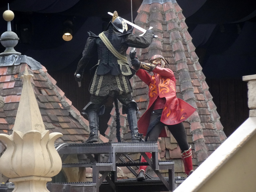 Actors on the stage of the Raveleijn theatre at the Marerijk kingdom, during the Raveleijn Parkshow, viewed from the Wapen van Raveleijn restaurant