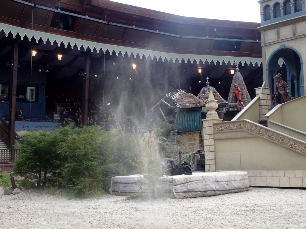 Actors on the stage of the Raveleijn theatre at the Marerijk kingdom, during the Raveleijn Parkshow, viewed from the Wapen van Raveleijn restaurant