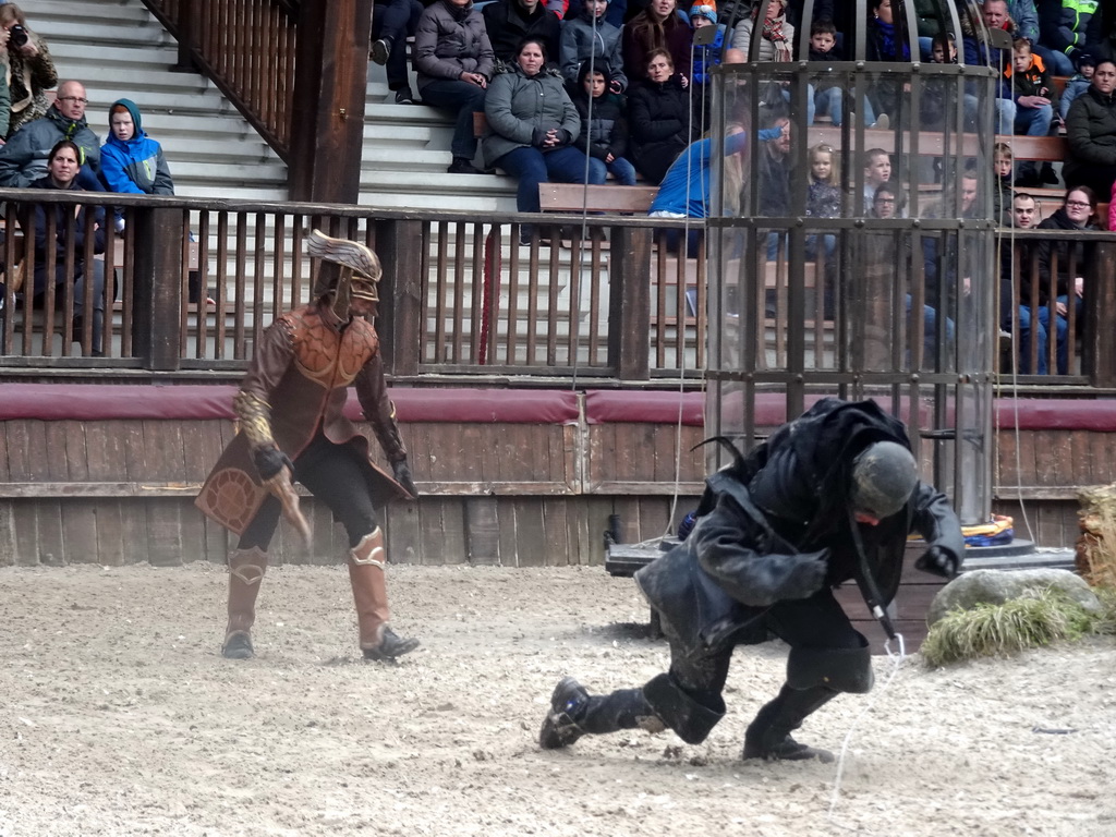 Actors on the stage of the Raveleijn theatre at the Marerijk kingdom, during the Raveleijn Parkshow, viewed from the Wapen van Raveleijn restaurant