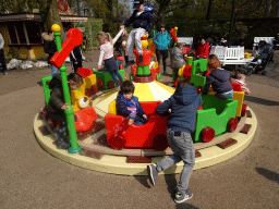 Max playing with bubbles at the Kleuterhof playground at the Reizenrijk kingdom