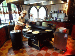 Cooks making pancakes at the Polles Keuken restaurant at the Fantasierijk kingdom