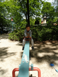 Max on a seesaw at the Kindervreugd playground at the Marerijk kingdom