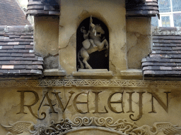 Statuette and inscription on the gate on the stage of the Raveleijn theatre at the Marerijk kingdom, during the Raveleijn Parkshow