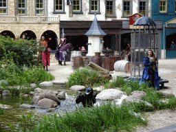 Actors and horses on the stage of the Raveleijn theatre at the Marerijk kingdom, during the Raveleijn Parkshow