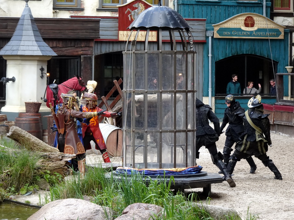 Actors and horses on the stage of the Raveleijn theatre at the Marerijk kingdom, during the Raveleijn Parkshow