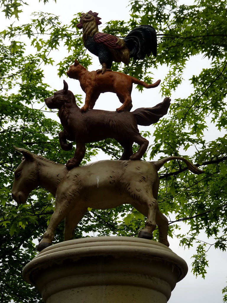 Statues on top of the Town Musicians of Bremen fountain at the Anton Pieck Plein square at the Marerijk kingdom