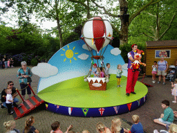 Actor and hand puppet at the Jokie and Jet attraction at the Carnaval Festival Square at the Reizenrijk kingdom