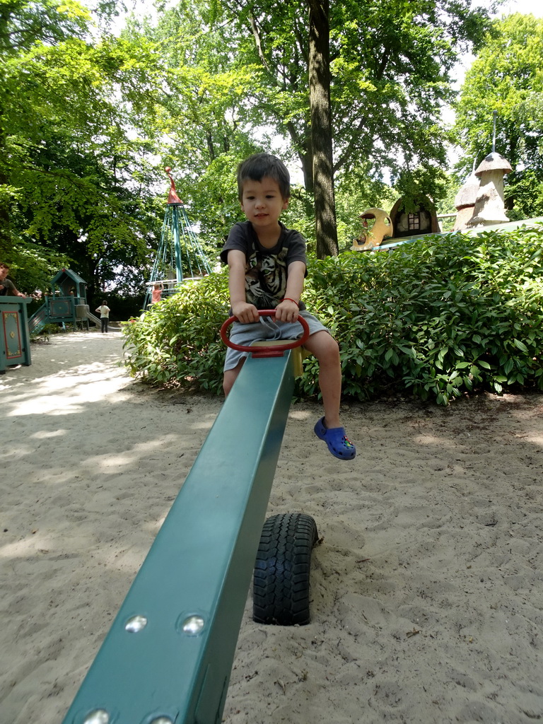 Max on a seesaw at the Kindervreugd playground at the Marerijk kingdom