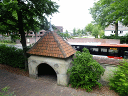 Small building with bench at the Laafland attraction at the Marerijk kingdom and the Europalaan street, viewed from the monorail