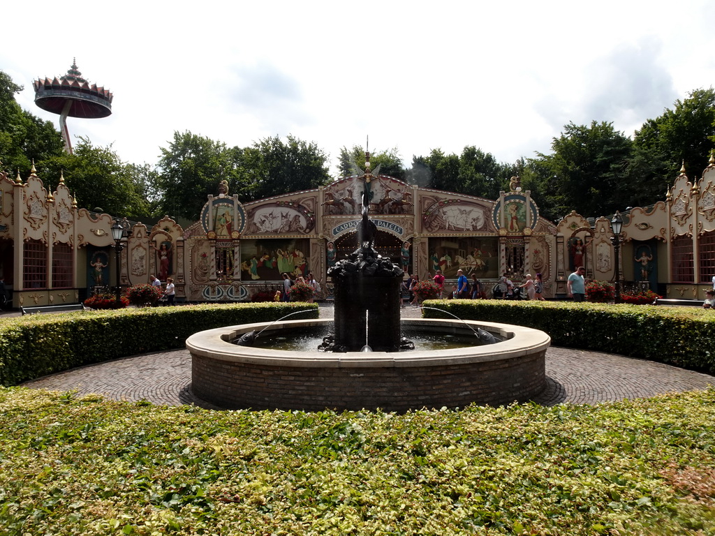 Pelican fountain and the front of the Carrouselpaleis attraction at the Carrouselplein square at the Marerijk kingdom, and the Pagoda attraction at the Reizenrijk kingdom