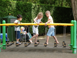 Max with a lollipop at the Kleuterhof playground at the Marerijk kingdom