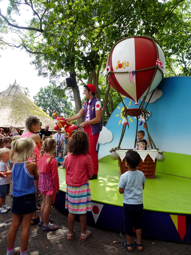 Actor and hand puppet at the Jokie and Jet attraction at the Carnaval Festival Square at the Reizenrijk kingdom