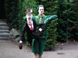 Actor with hand puppet during the Sprookjesboom Show at the Open-air Theatre at the Fairytale Forest at the Marerijk kingdom