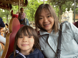 Miaomiao and Max at the Vermolen Carousel at the Anton Pieck Plein square at the Marerijk kingdom