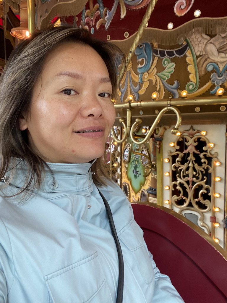 Miaomiao at the Vermolen Carousel at the Anton Pieck Plein square at the Marerijk kingdom