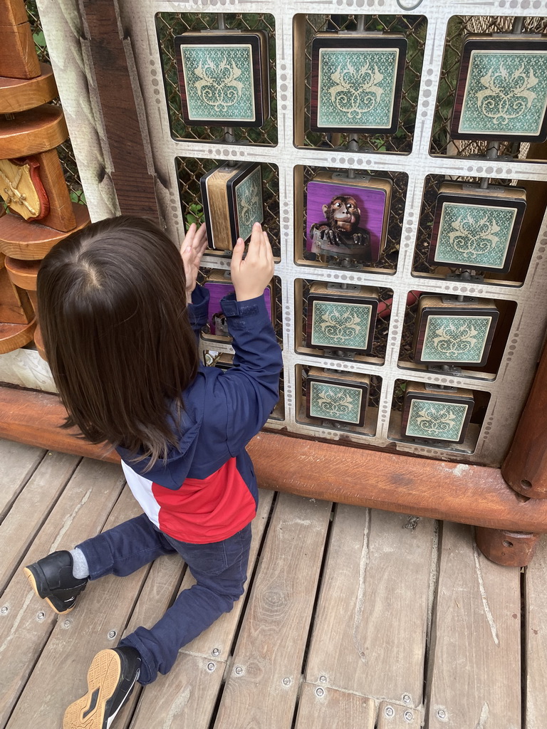 Max doing a puzzle at the Nest! play forest at the Ruigrijk kingdom