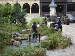 Actors on the stage of the Raveleijn theatre at the Marerijk kingdom, during the Raveleijn Parkshow