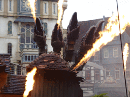 Actor, dragon and fire on the stage of the Raveleijn theatre at the Marerijk kingdom, during the Raveleijn Parkshow