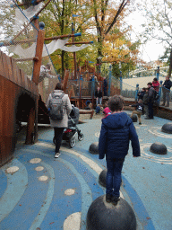 Max on stepping stones at the Nest! play forest at the Ruigrijk kingdom