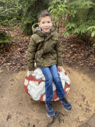 Max on a mushroom statue at the Fairytale Forest at the Marerijk kingdom