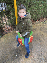 Max on a seesaw at the Kleuterhof playground at the Reizenrijk kingdom