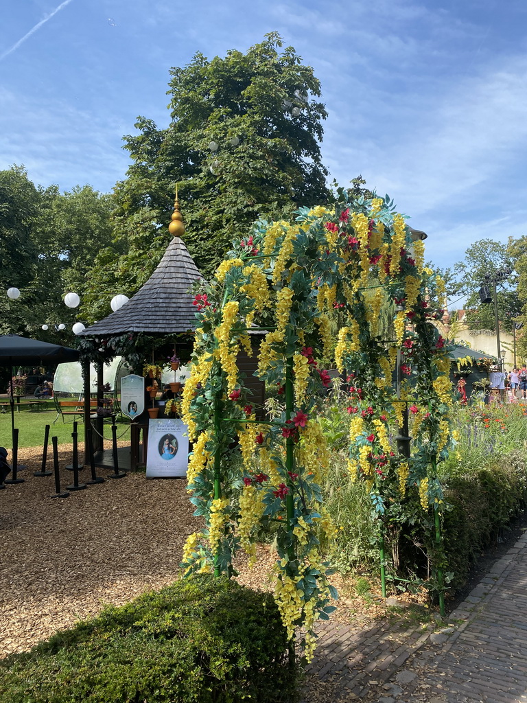 Kiosk and flowers at the Sint Nicolaasplaets square at the Marerijk kingdom, during the Summer Efteling