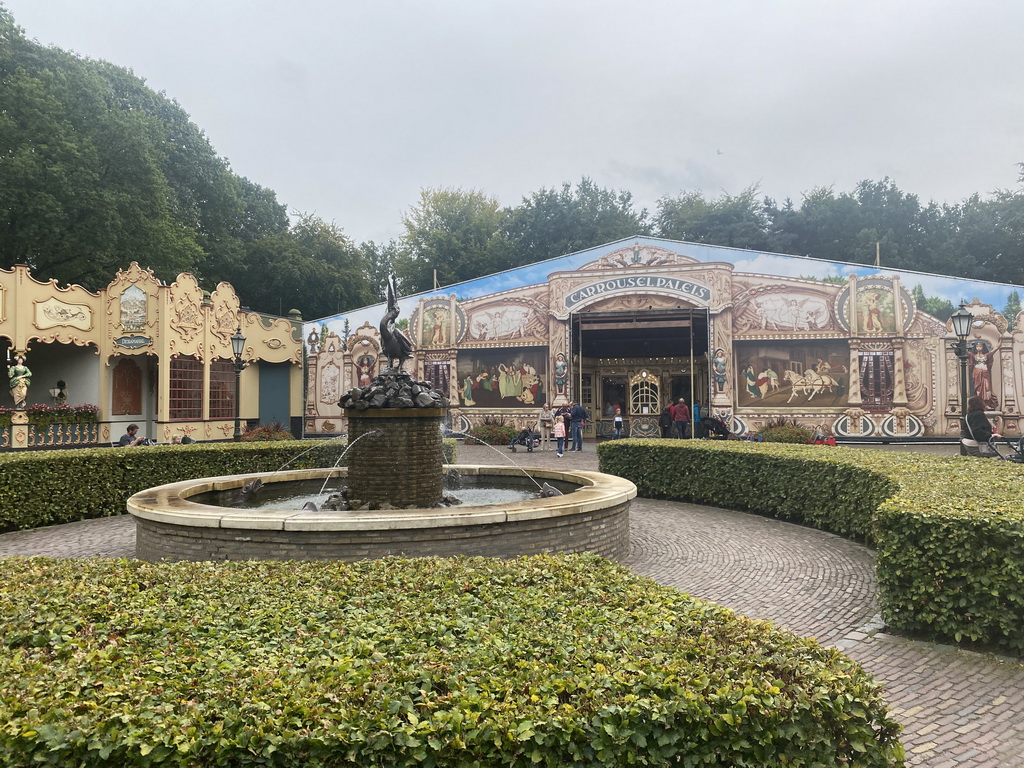 Pelican fountain and the front of the Carrouselpaleis attraction at the Carrouselplein square at the Marerijk kingdom