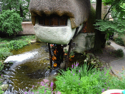 The Lal`s Brouwhuys building with water wheel at the Laafland attraction at the Marerijk kingdom, viewed from the monorail